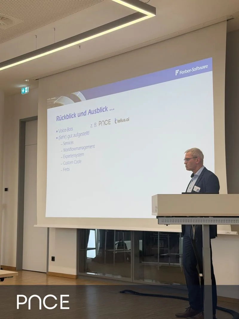 A talk at the conference; the slide lists voice bots among the topics