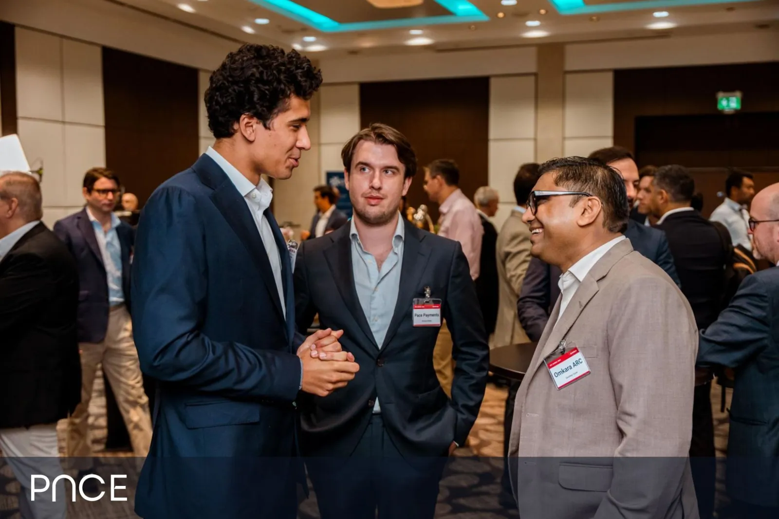 A conversation during the networking break at NPL Global in London